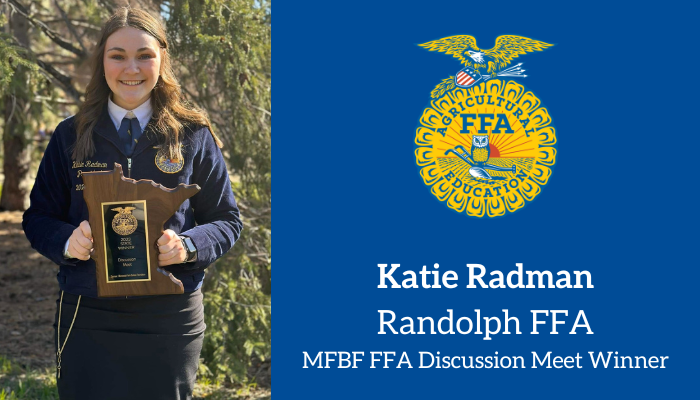 photo of Katie Radman with plaque and text