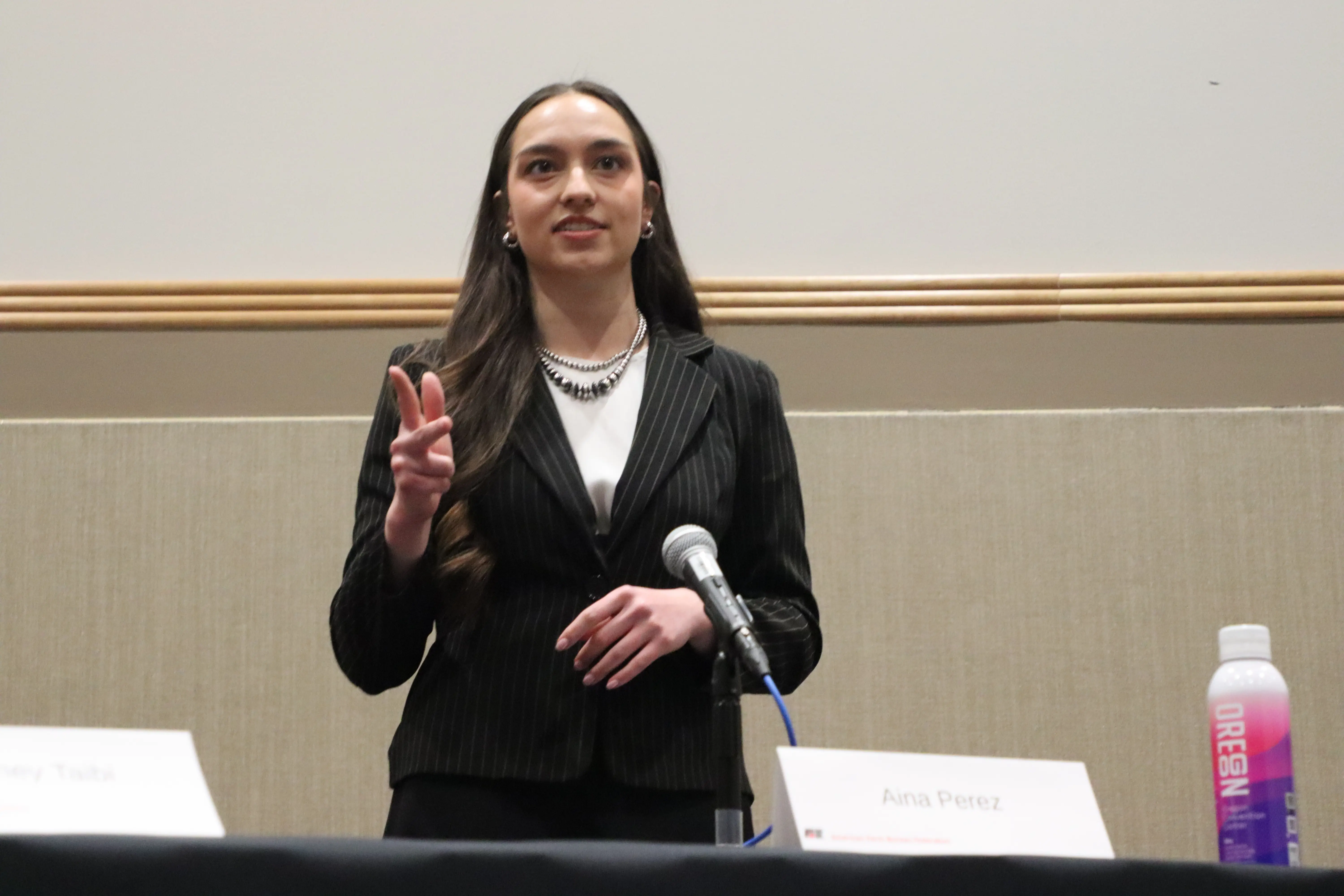 Katie Radman holding an award