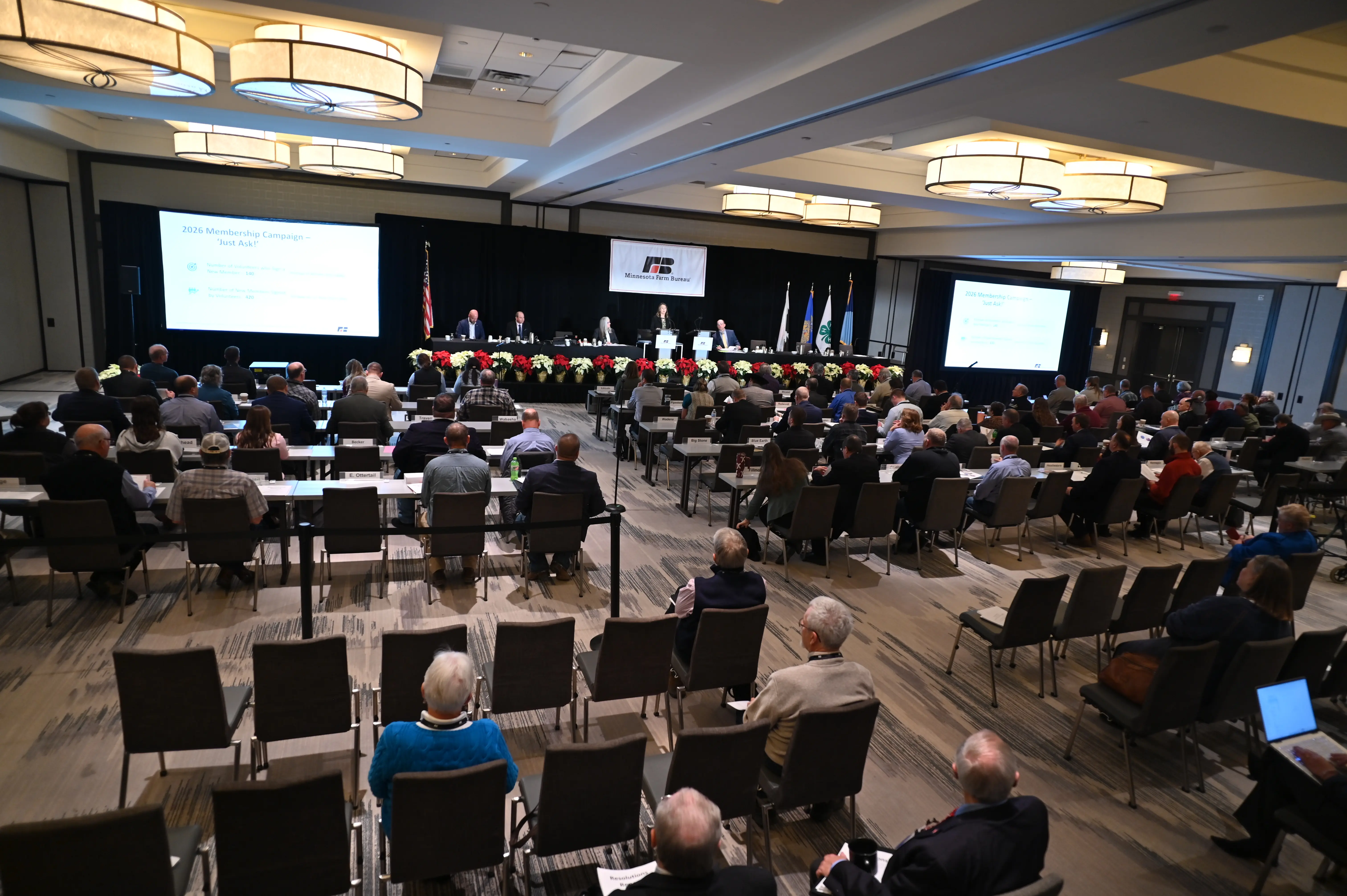 view from back of room looking at group of members seated at rows of tables during MFBF Annual Meeting